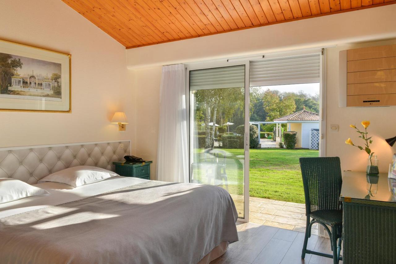 Logis Hotel Val De Vienne Le Vigeant Esterno foto